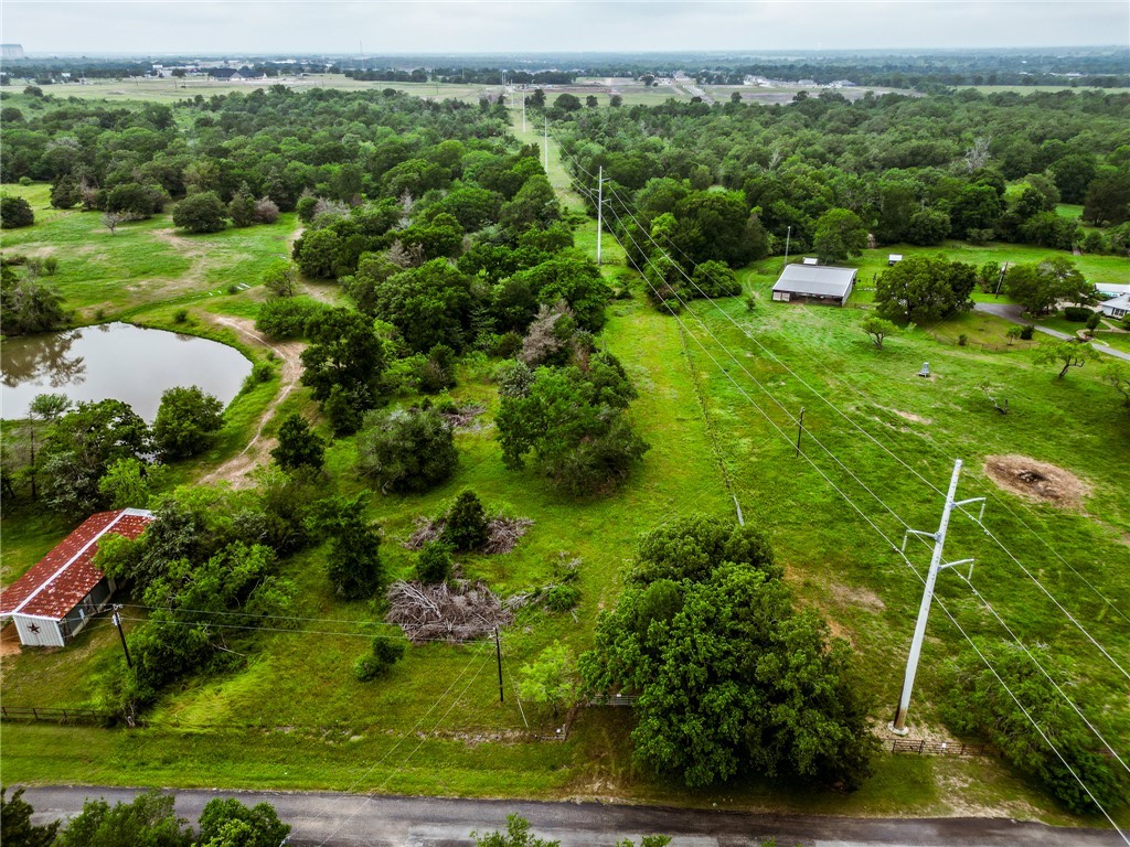 Tba Winding Crk Road College Station, TX 77845 - Photo 1 of 10 a view of a garden with a lake