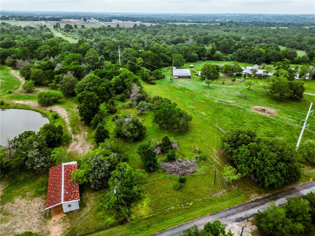 Tba Winding Crk Road College Station, TX 77845 - Photo 3 of 10 a view of a garden with a building in the background