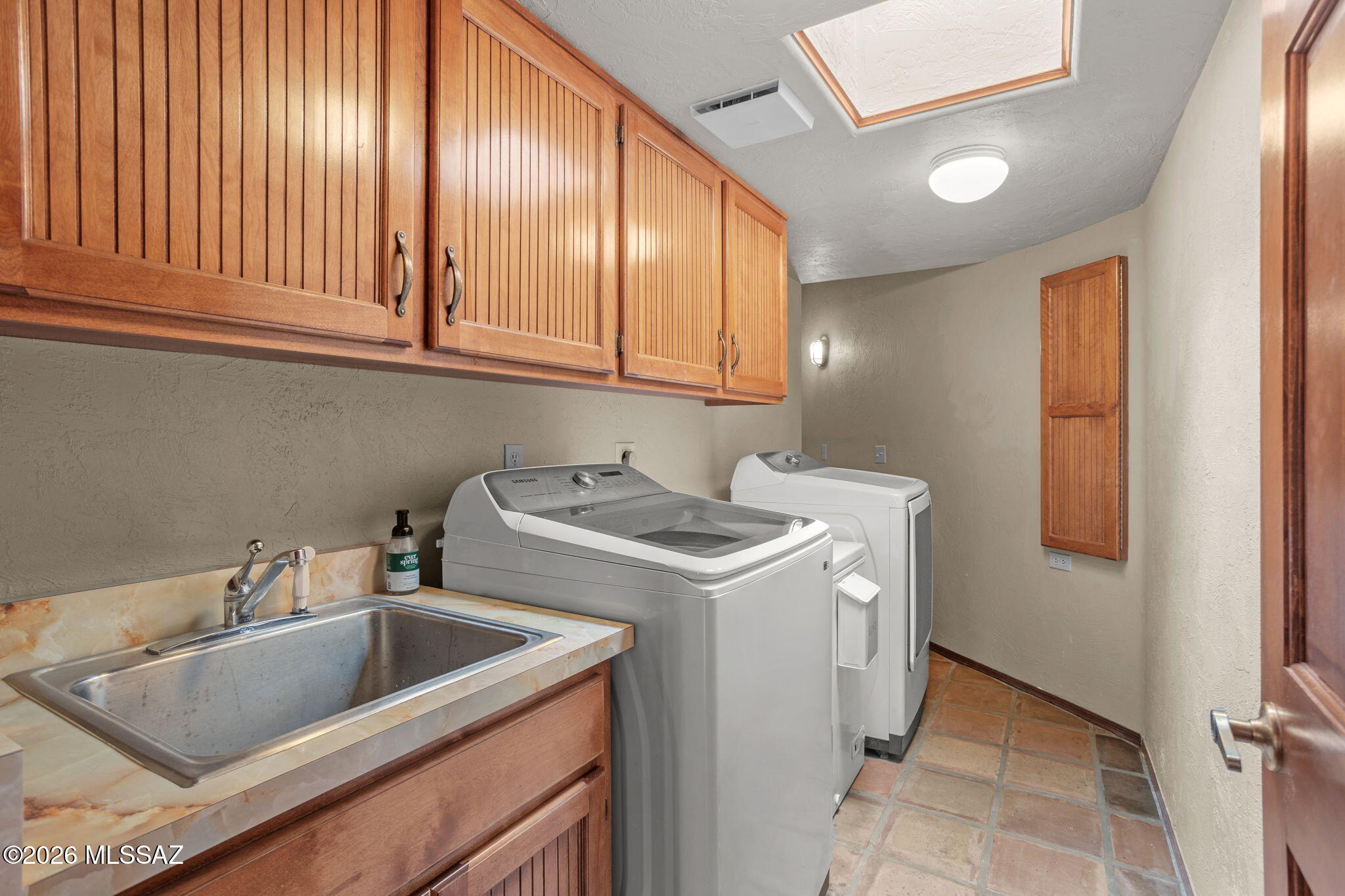 7171 South X9 Ranch Road Vail, AZ 85641 - Photo 36 of 50 Laundry Rm includes sink, W/D, chest freezer, cabinets & counter