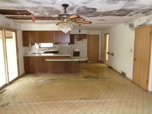 607 North Fleming Road Woodstock, IL 60098 - Photo 6 of 12 a view of a kitchen with a sink and cabinets