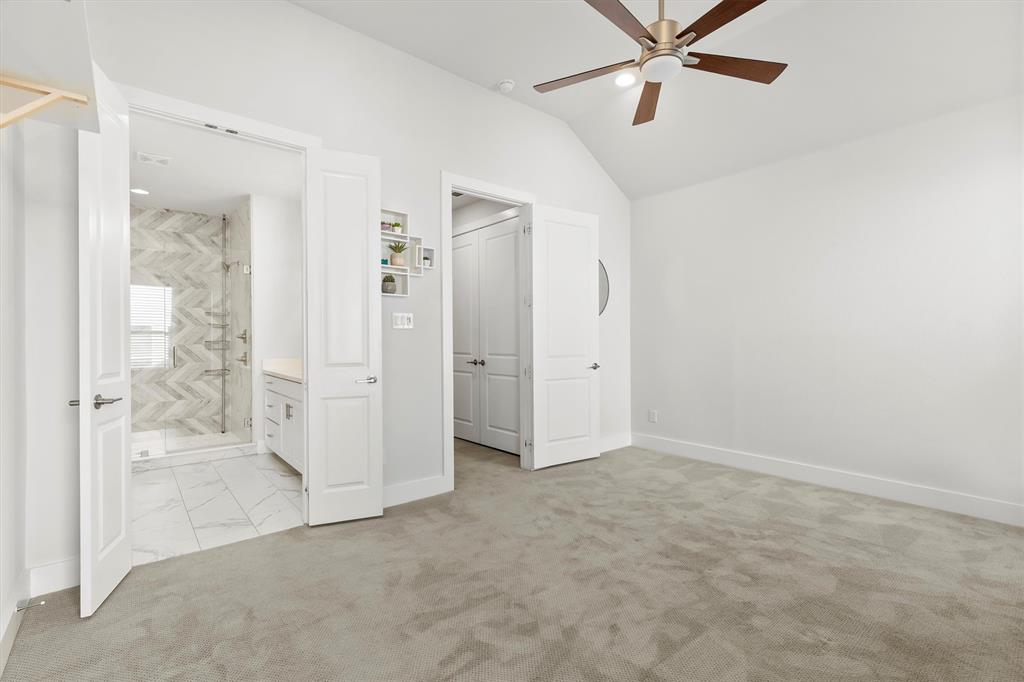 1103 Lavender Ridge Dallas, TX 75204 - Photo 12 of 30 an empty room with fan and entrance