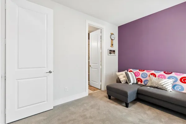 a living room with furniture and a couch