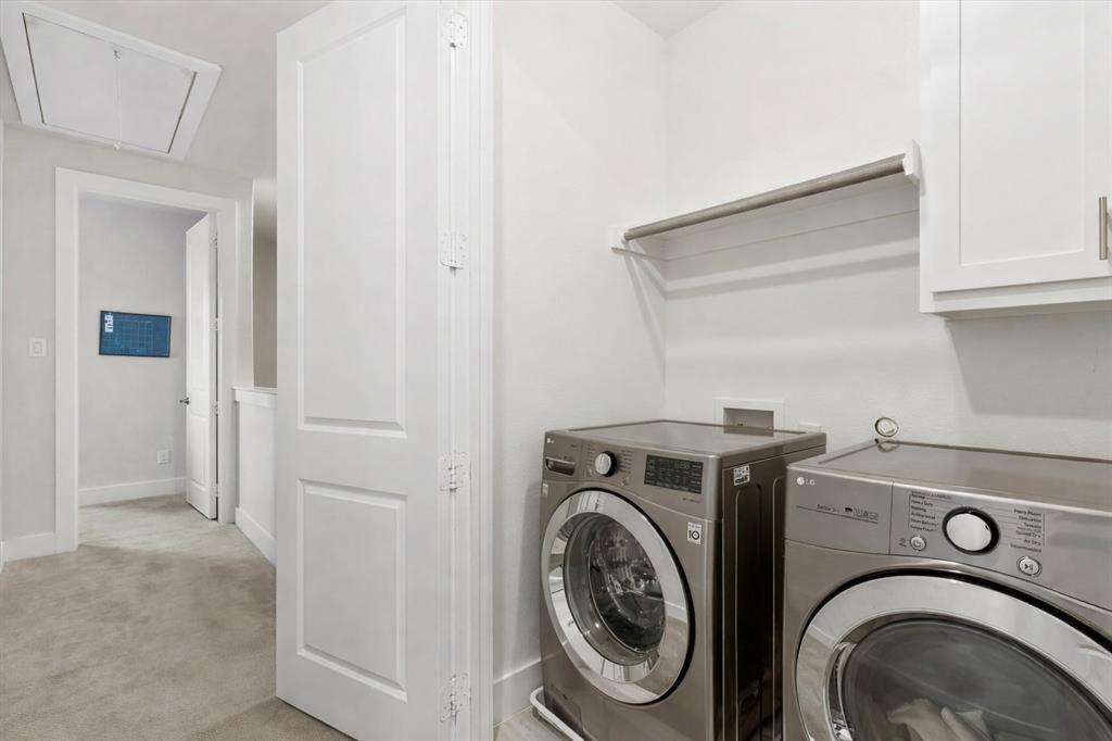 1103 Lavender Ridge Dallas, TX 75204 - Photo 23 of 30 a utility room with dryer and washer