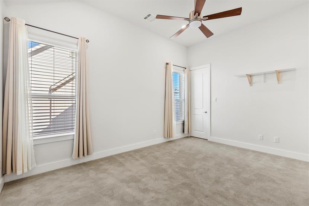 1103 Lavender Ridge Dallas, TX 75204 - Photo 10 of 30 a view of an empty room with a window