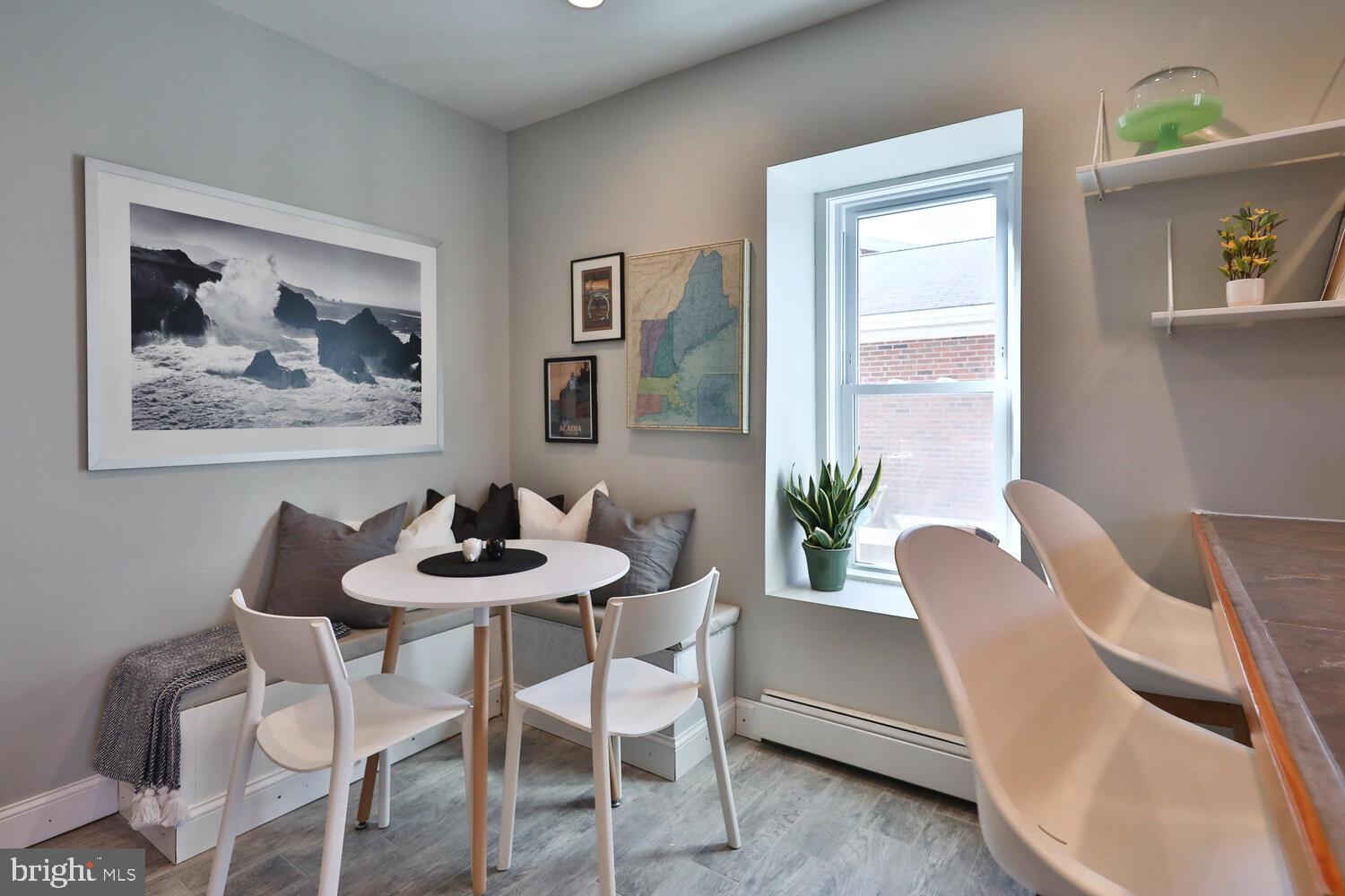 388 Ripka Street Philadelphia, PA 19128 - Photo 12 of 38 a dining room with furniture and wooden floor