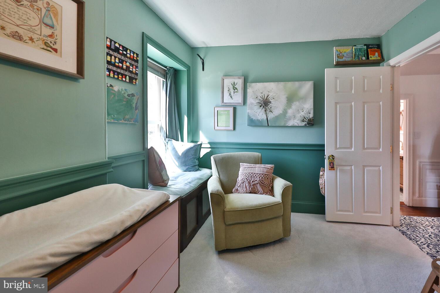 388 Ripka Street Philadelphia, PA 19128 - Photo 26 of 38 a living room with furniture and wall paintings