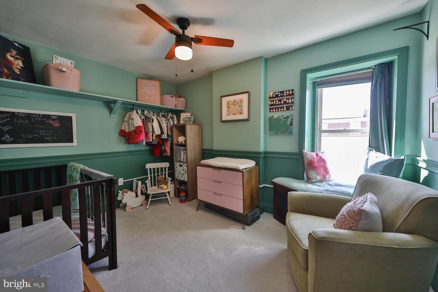 388 Ripka Street Philadelphia, PA 19128 - Photo 27 of 38 a living room with furniture and a window