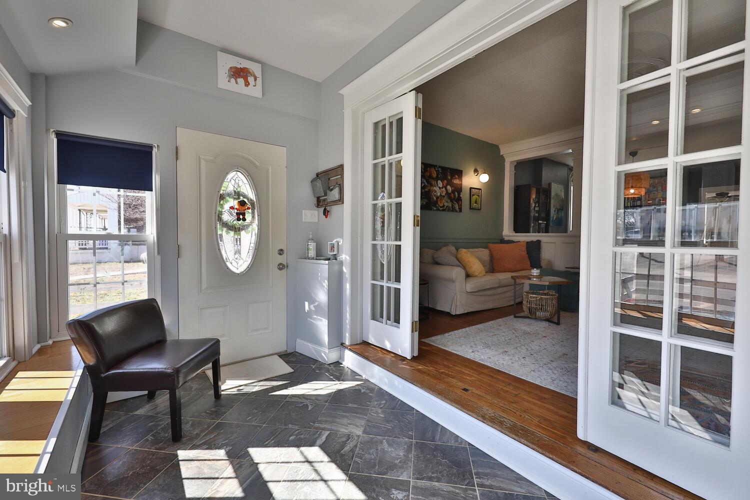 388 Ripka Street Philadelphia, PA 19128 - Photo 3 of 38 a living room with furniture and a large window