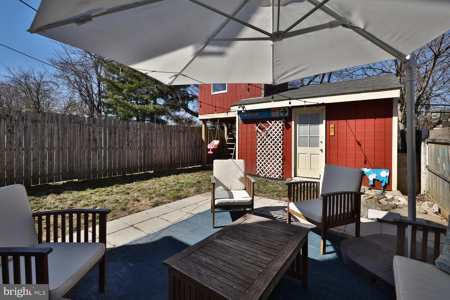 388 Ripka Street Philadelphia, PA 19128 - Photo 32 of 38 a outdoor space with patio furniture and a potted plant