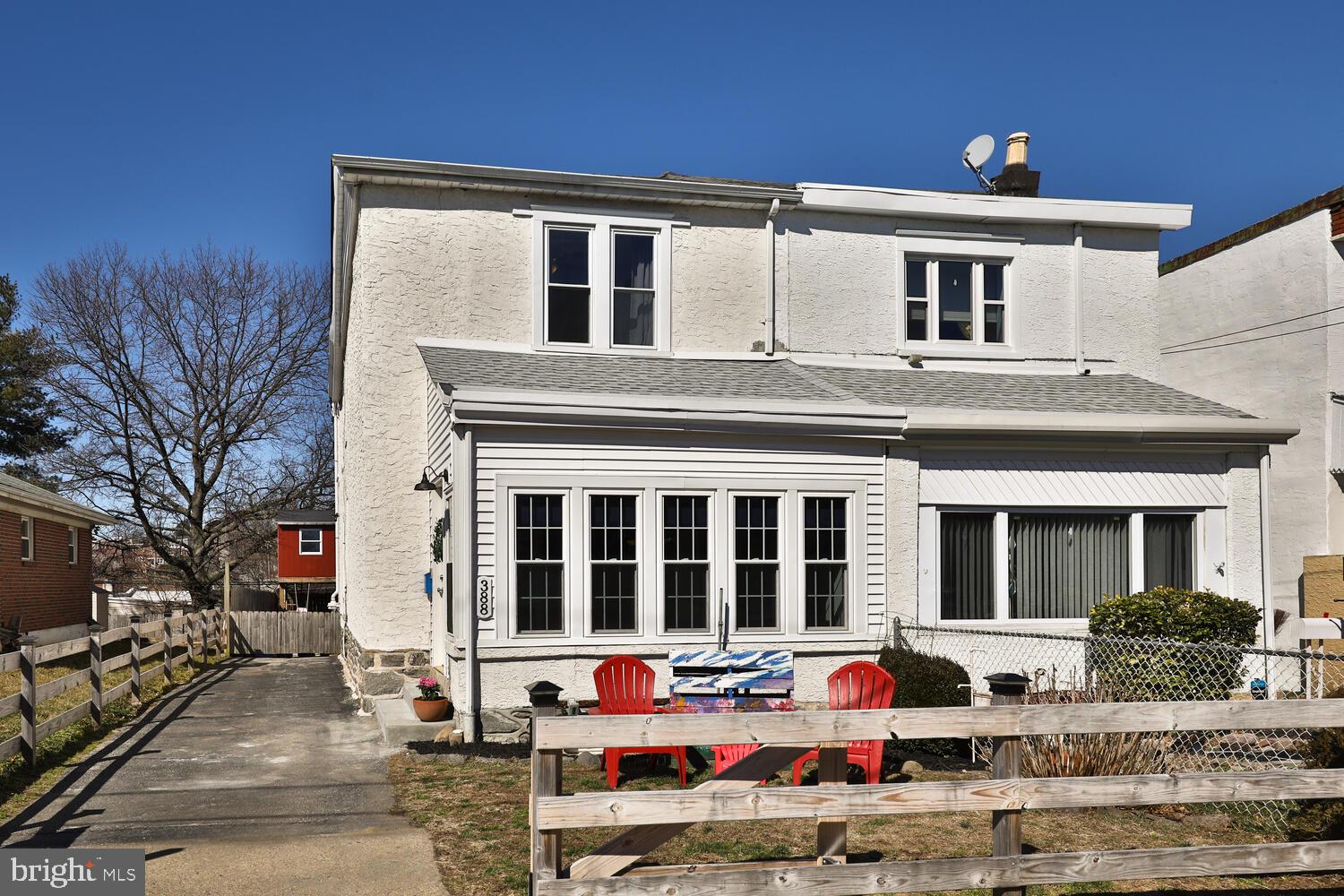 388 Ripka Street Philadelphia, PA 19128 - Photo 38 of 38 a front view of houses with yard