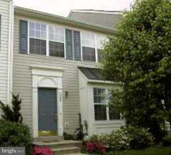 308 Rover Court Stafford, VA 22554 - Photo 1 of 14 a view of a house with a yard and potted plants