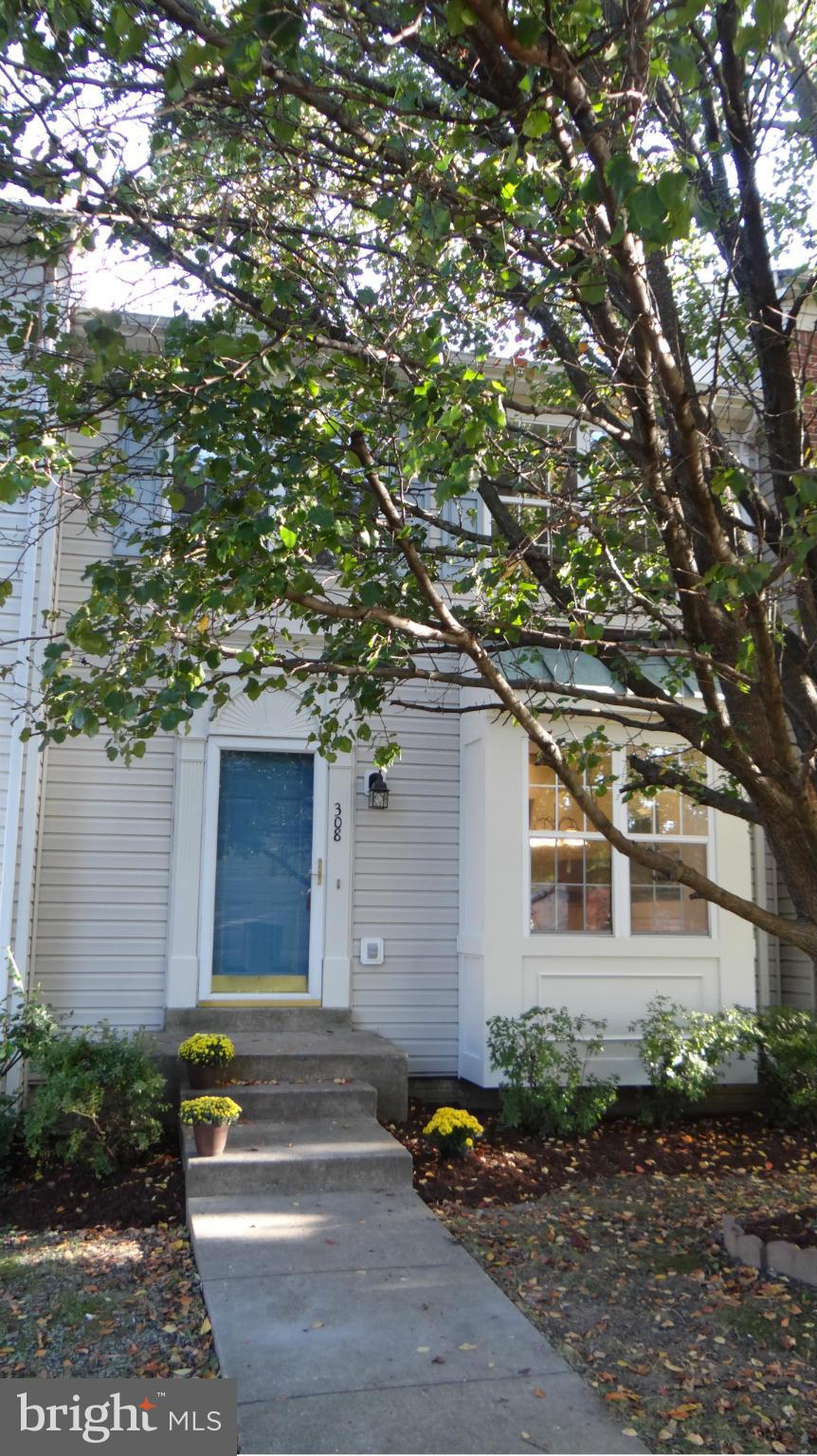 308 Rover Court Stafford, VA 22554 - Photo 2 of 14 a front view of a house with garden