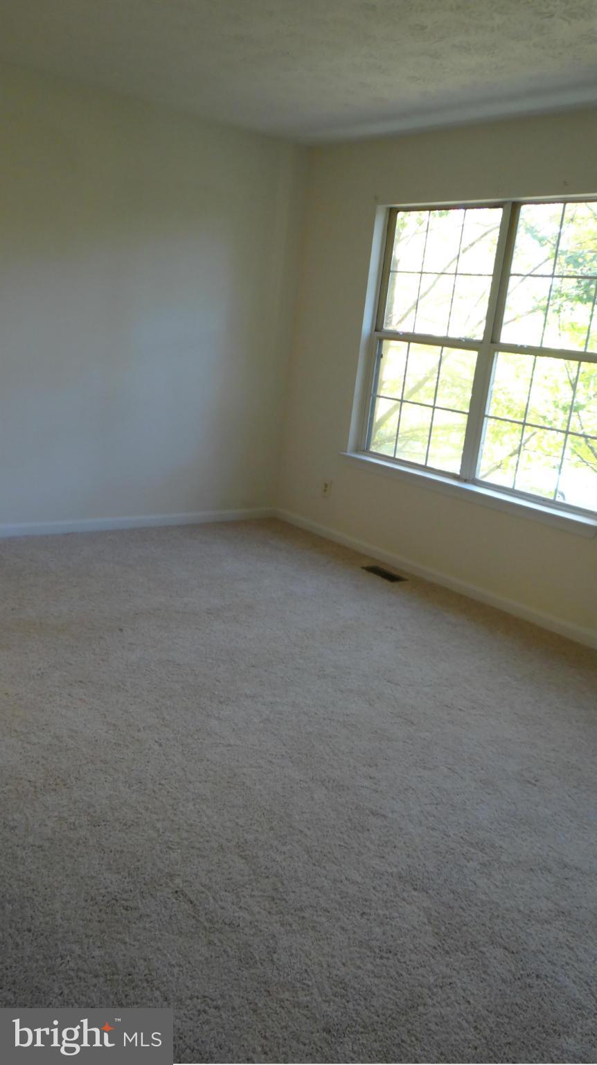 308 Rover Court Stafford, VA 22554 - Photo 11 of 14 an empty room with a window