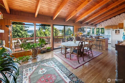 a outdoor space with chairs a couch and chairs