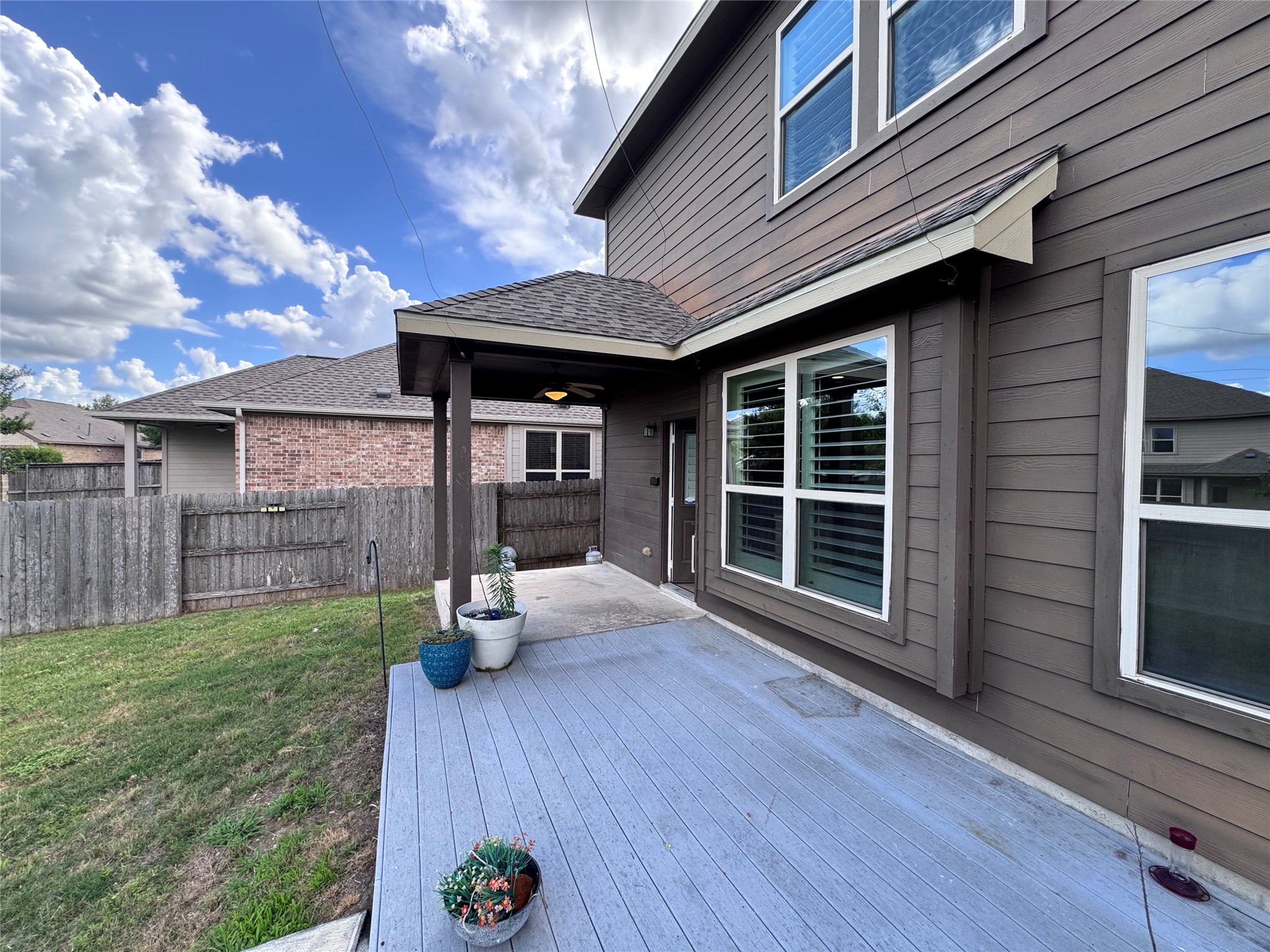 2605 Rough Berry Road Pflugerville, TX 78660 - Photo 37 of 40 A spacious backyard patio provides an ideal setting for outdoor enjoyment.