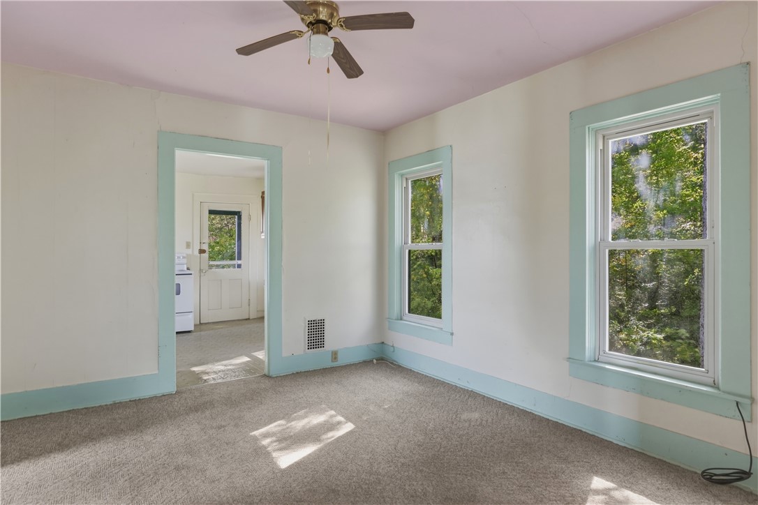 5 Powderhouse Road Corning, NY 14830 - Photo 25 of 47 Double sash windows frame leafy views in this carp