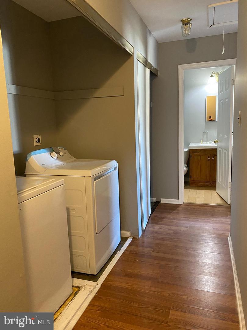 14 Berkshire Road Sicklerville, NJ 08081 - Photo 12 of 15 a view of a storage & utility room with washer and dryer