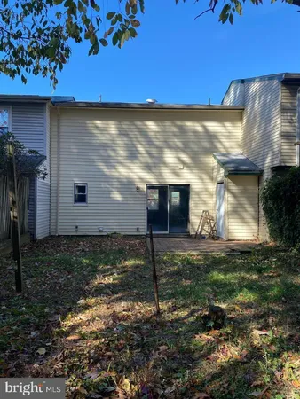 a view of a back yard of the house