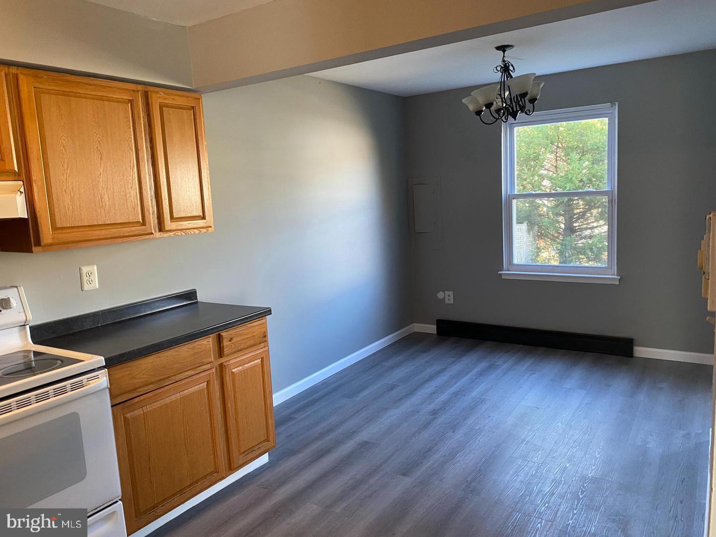 14 Berkshire Road Sicklerville, NJ 08081 - Photo 3 of 15 a view of an empty room with wooden floor and a window