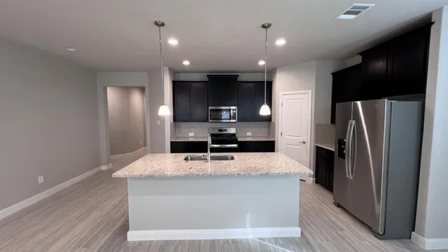 a view of a garden with a lake view