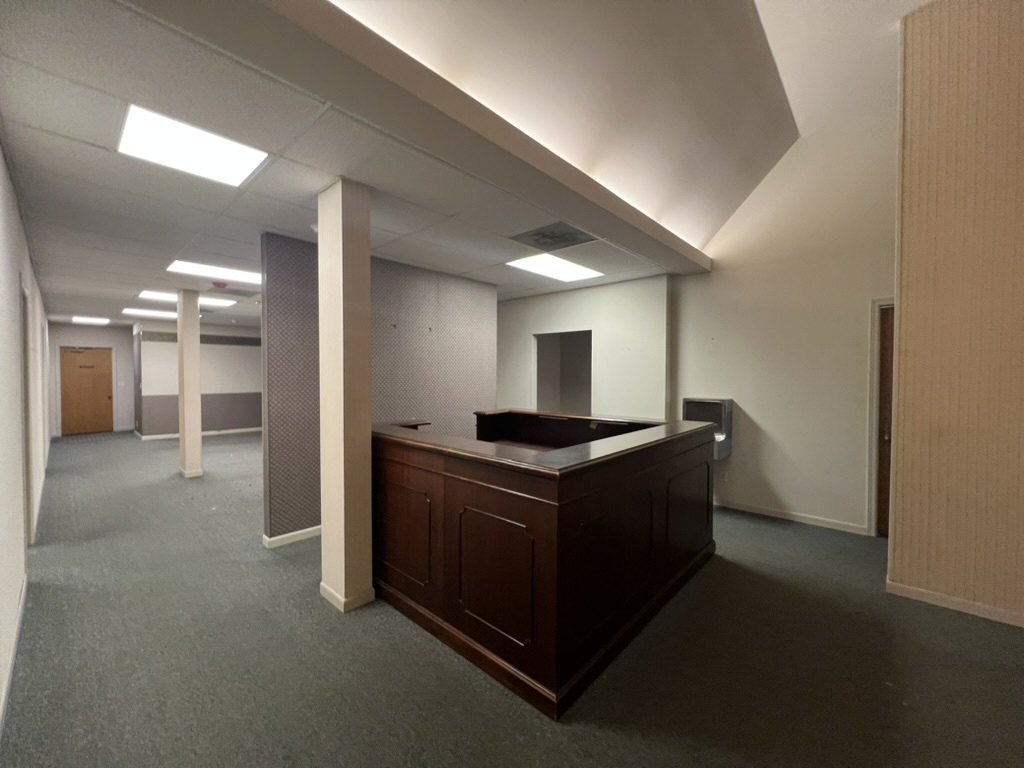 227 West Madison Street Ottawa, IL 61350 - Photo 5 of 9 a kitchen with stainless steel appliances granite countertop a stove and a refrigerator