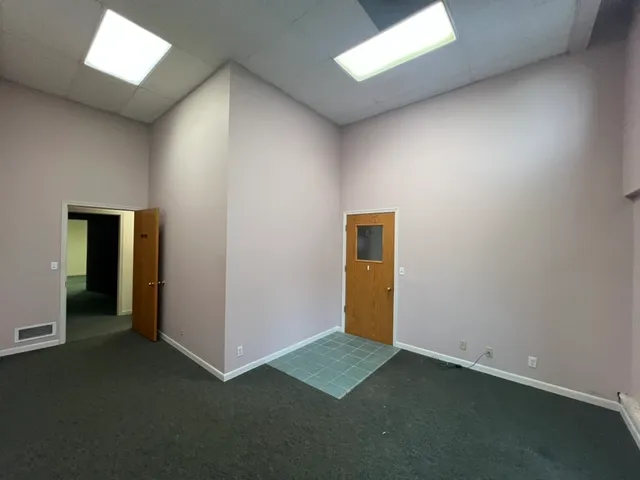 an empty room with windows