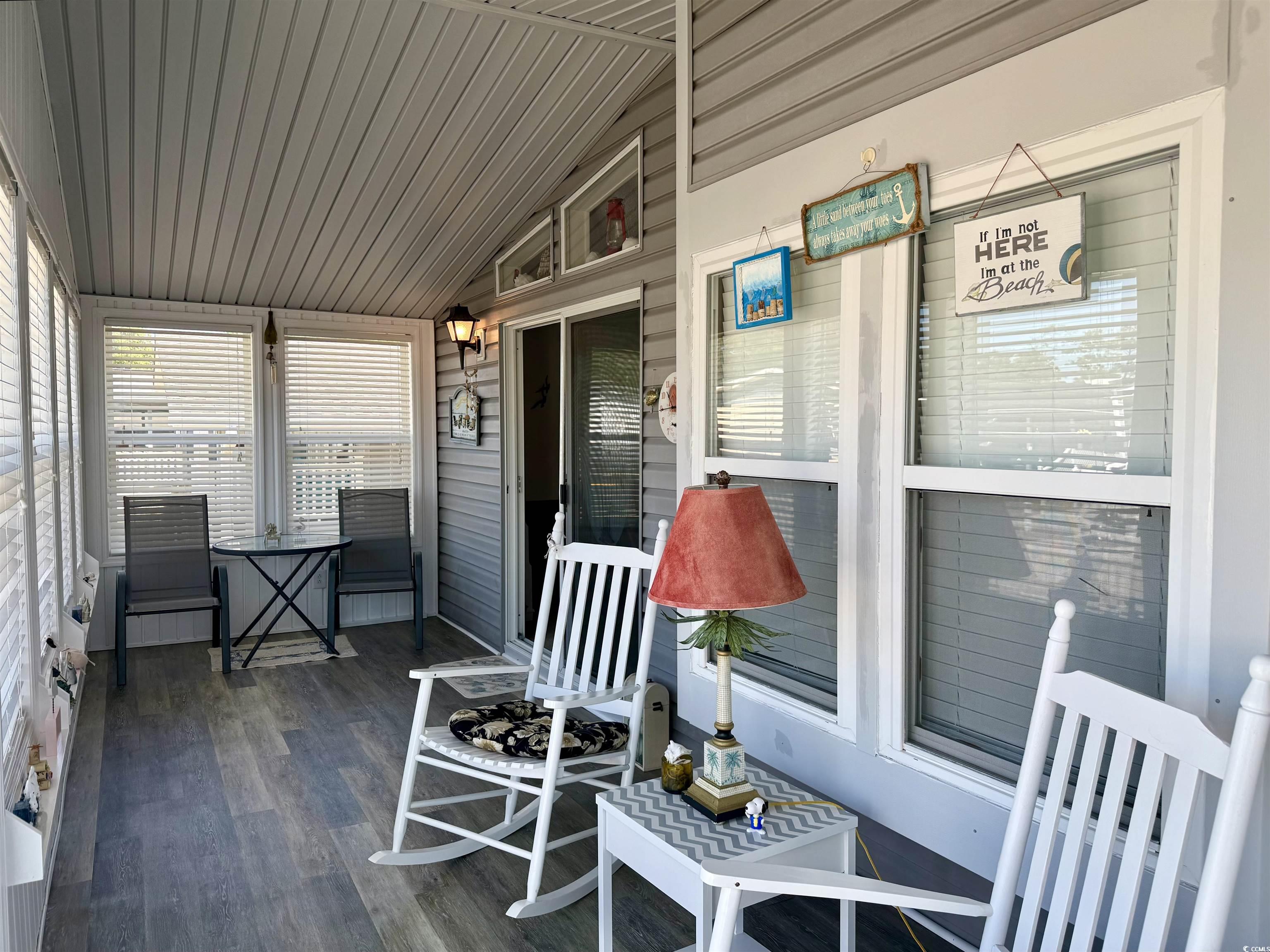 505 Sandpebble Surfside Beach, SC 29575 - Photo 18 of 27 Sunroom with lofted ceiling