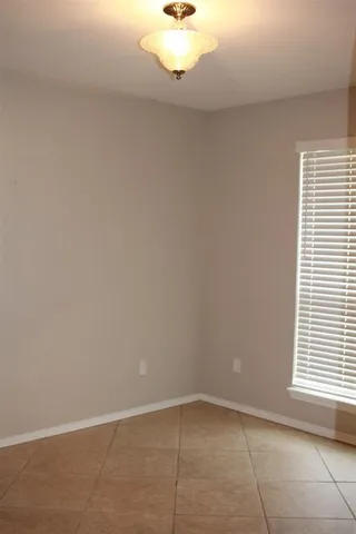 a view of a room with a window