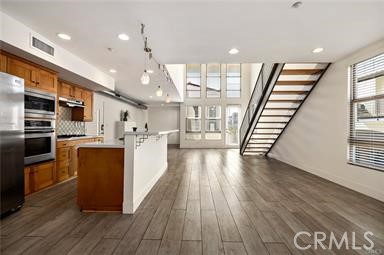 536 North Brea Boulevard Brea, CA 92821 - Photo 11 of 30 a view of kitchen with cabinets and wooden floor