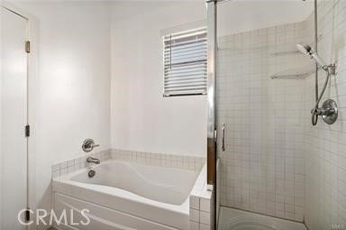 536 North Brea Boulevard Brea, CA 92821 - Photo 28 of 30 a bathroom with a tub and a shower