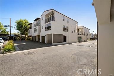 536 North Brea Boulevard Brea, CA 92821 - Photo 30 of 30 a view of a white house with a yard