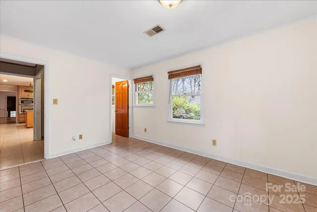 an empty room with windows