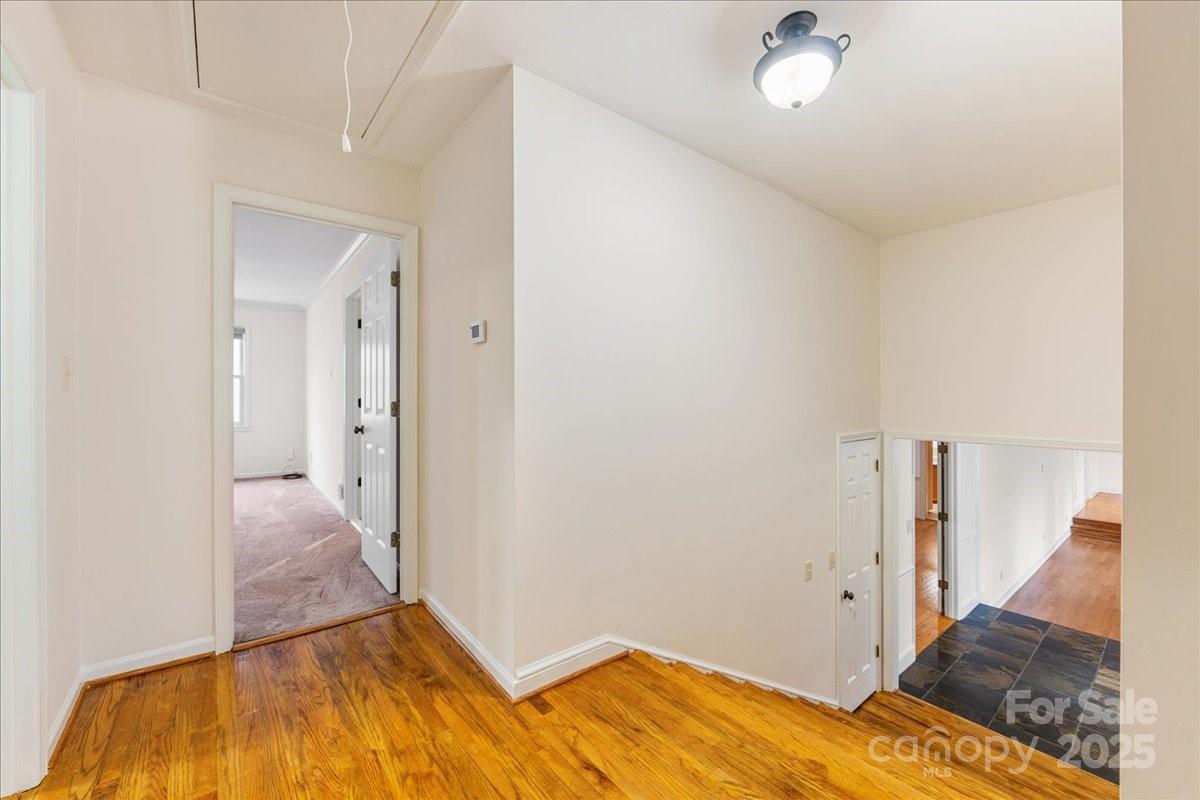 3212 Nancy Creek Road Charlotte, NC 28270 - Photo 15 of 44 a view of hallway with wooden floor