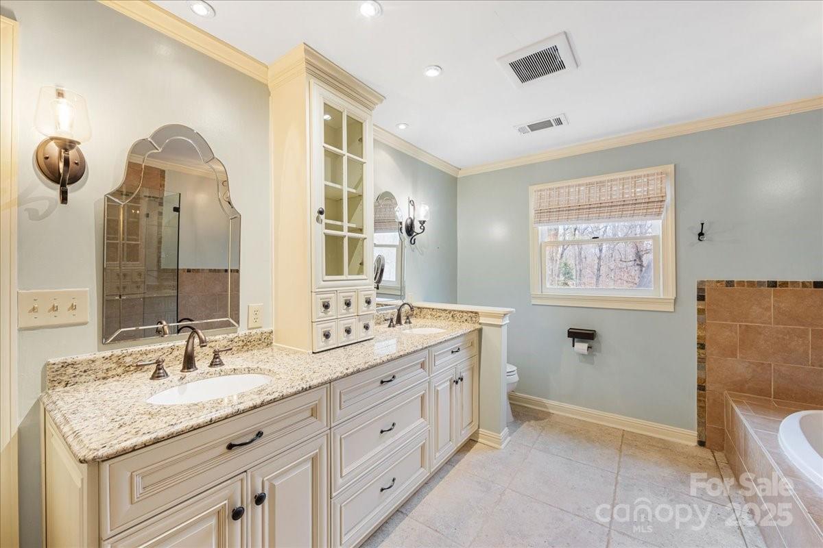 3212 Nancy Creek Road Charlotte, NC 28270 - Photo 19 of 44 a bathroom with a granite countertop sink mirror and double