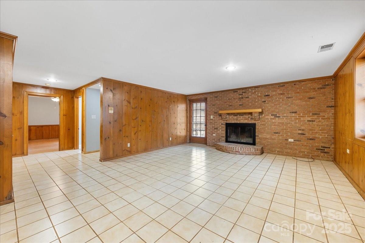 3212 Nancy Creek Road Charlotte, NC 28270 - Photo 27 of 44 a view of an empty room and a fireplace