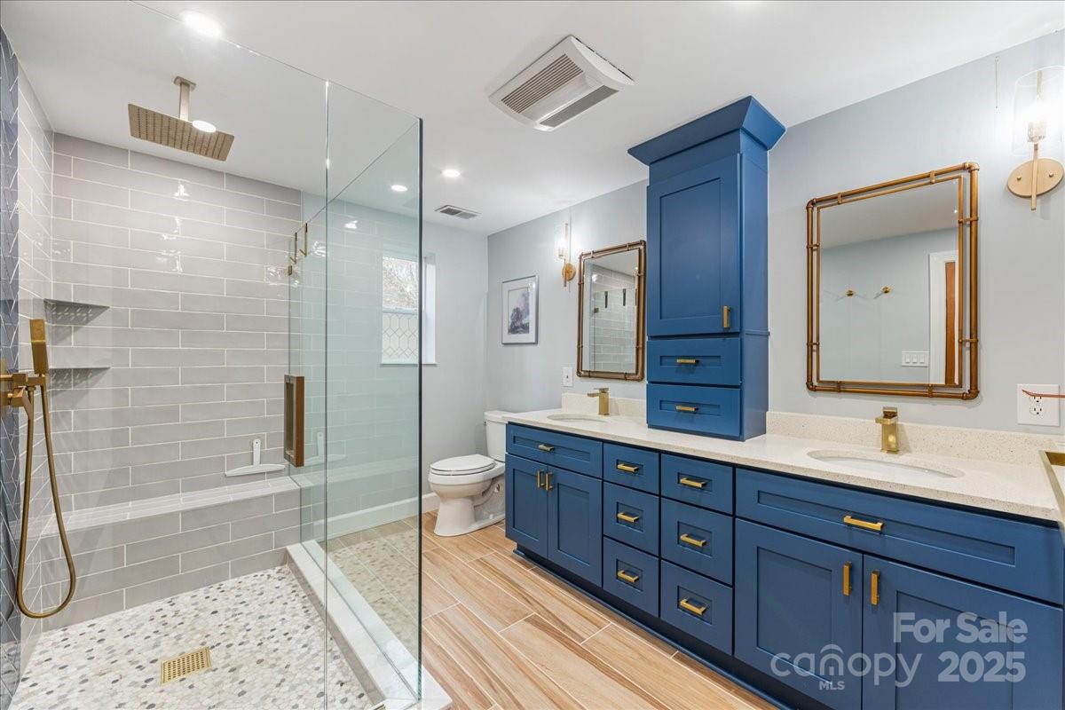 3212 Nancy Creek Road Charlotte, NC 28270 - Photo 33 of 44 a bathroom with a double vanity sink mirror and shower