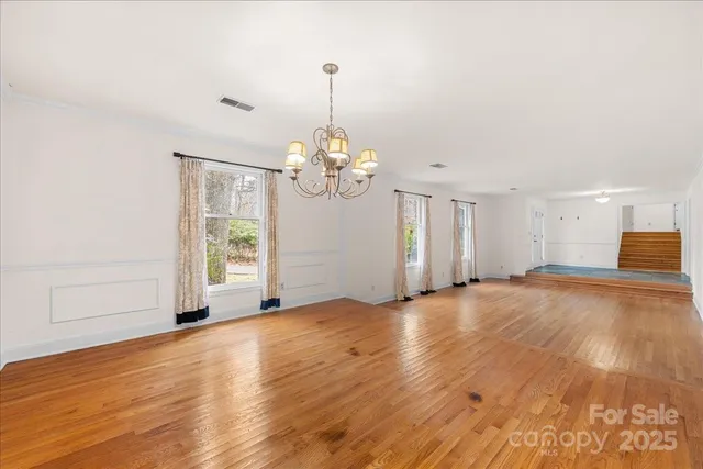 a view of a livingroom with wooden floor