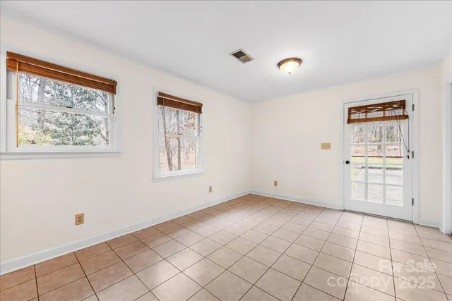 a view of an empty room with window