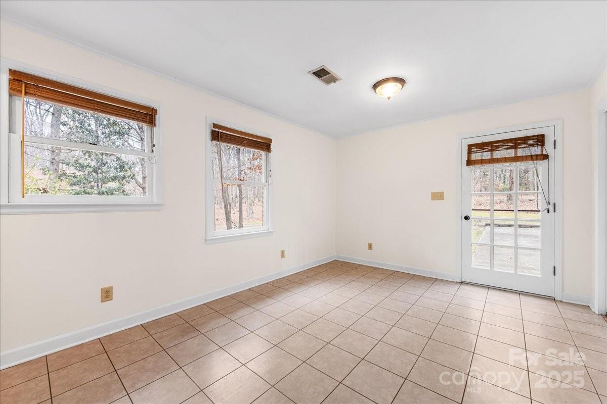 3212 Nancy Creek Road Charlotte, NC 28270 - Photo 10 of 44 a view of an empty room with window