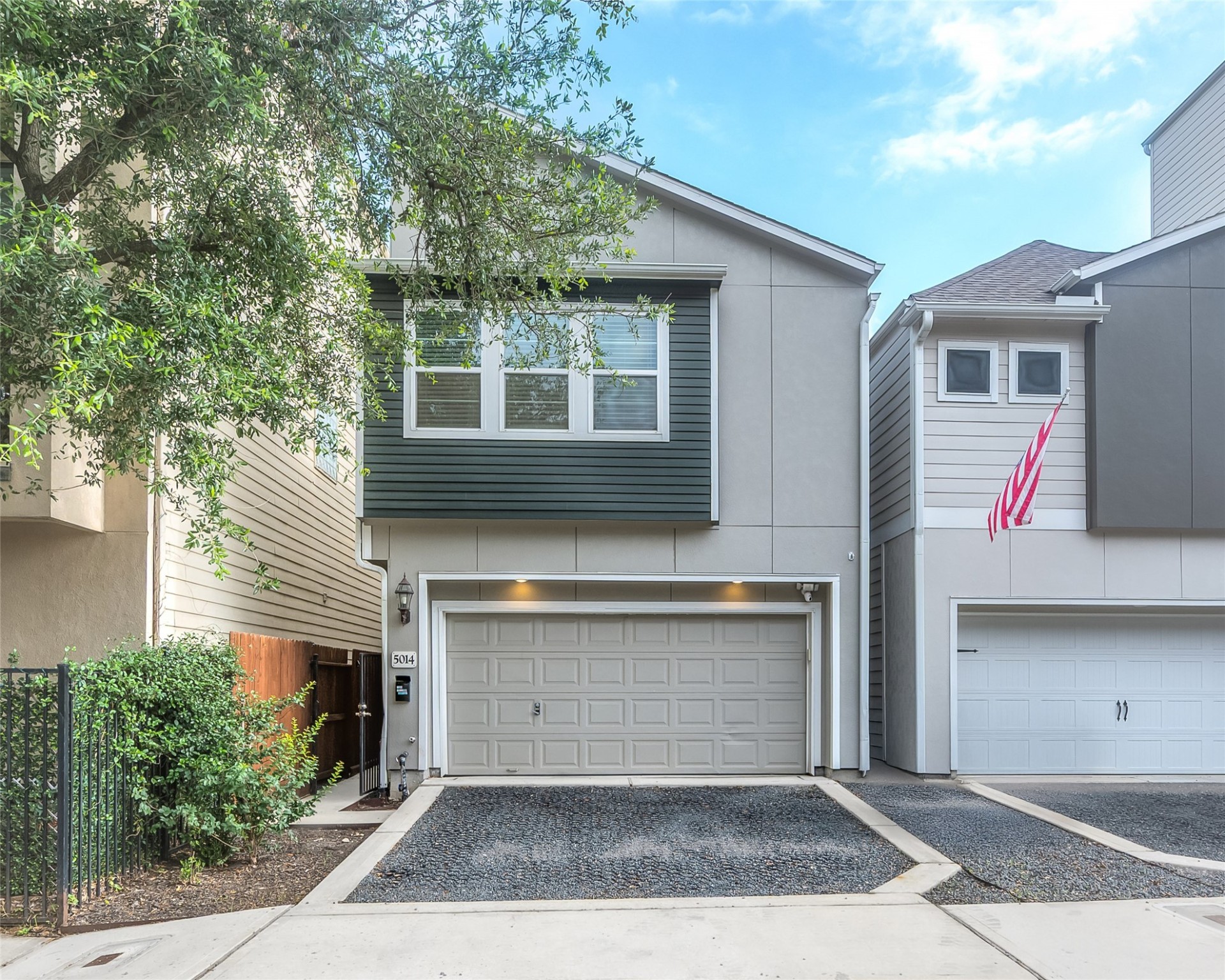 a front view of a house with yard