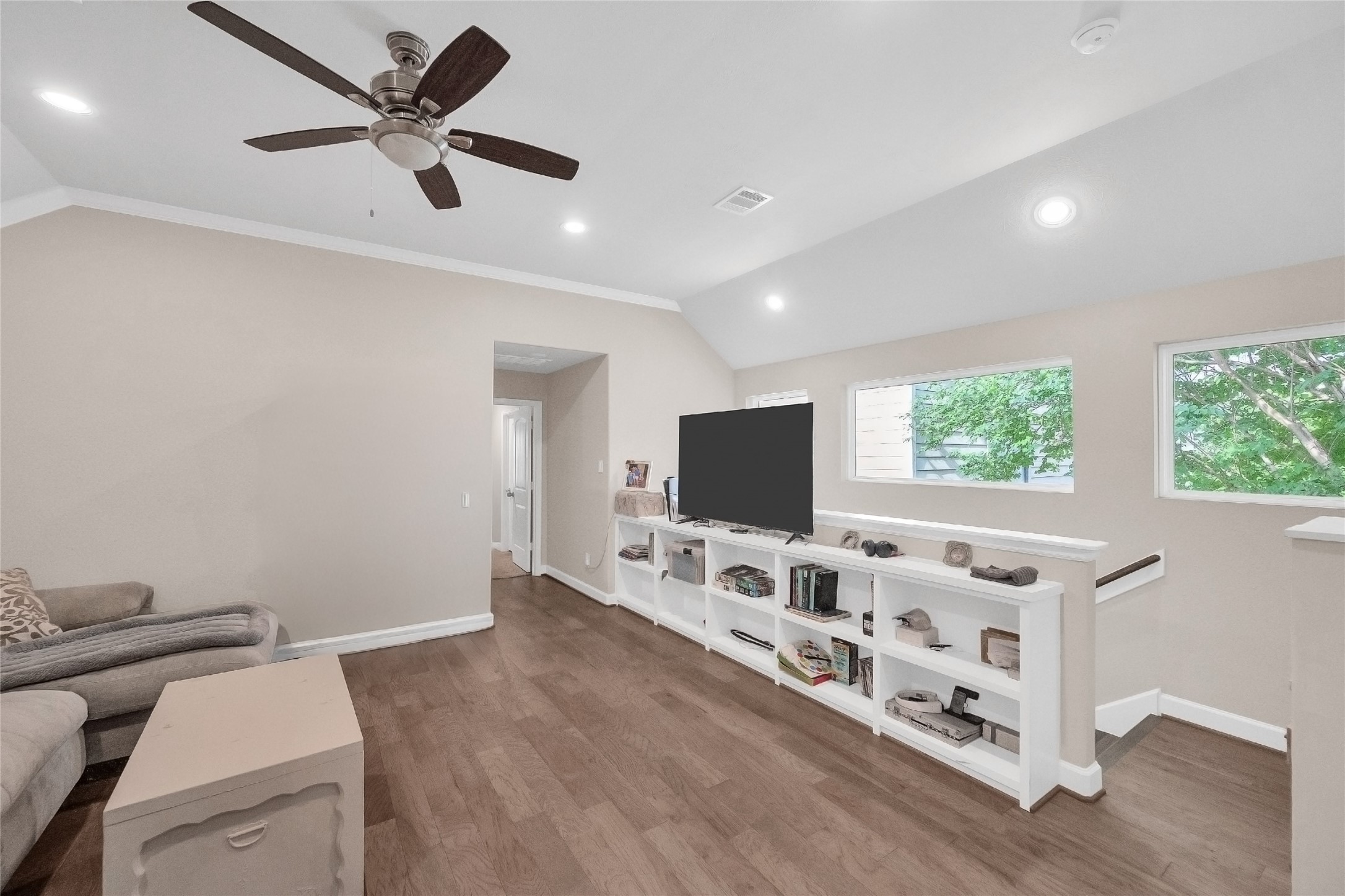 5014 Lillian Street Houston, TX 77007 - Photo 13 of 24 a living room with furniture and a flat screen tv