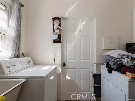 a bedroom with a bed and a window in it