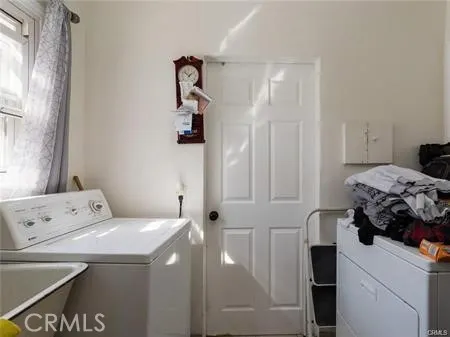 a bedroom with a bed and a window in it