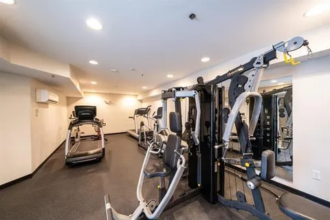 a view of a room with gym equipment