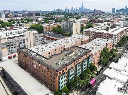 a view of balcony with furniture