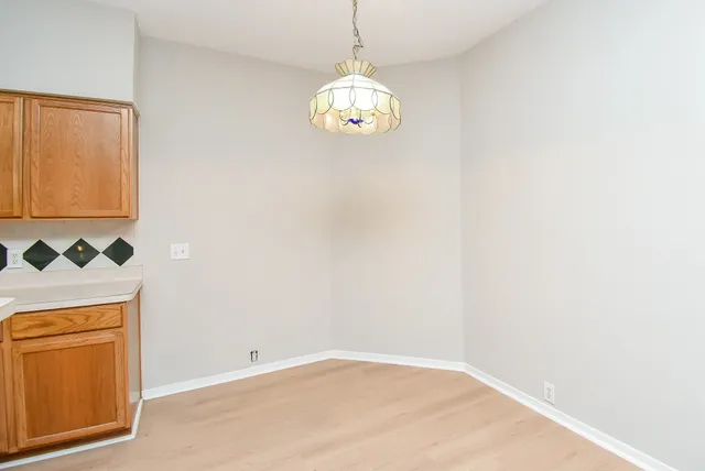 a view of a livingroom with furniture and a fireplace