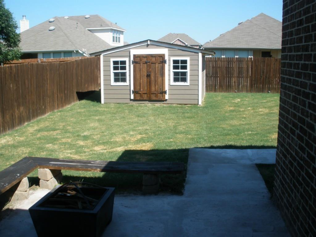 511 Mimosa Trail Forney, TX 75126 - Photo 23 of 30 Great space for outside tools. Door has been replaced