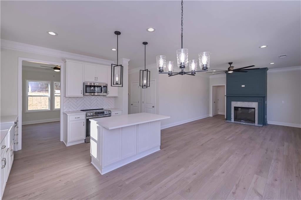 262 Corinth-Five Points Road Buchanan, GA 30113 - Photo 18 of 41 a view of kitchen and sink with wooden floor