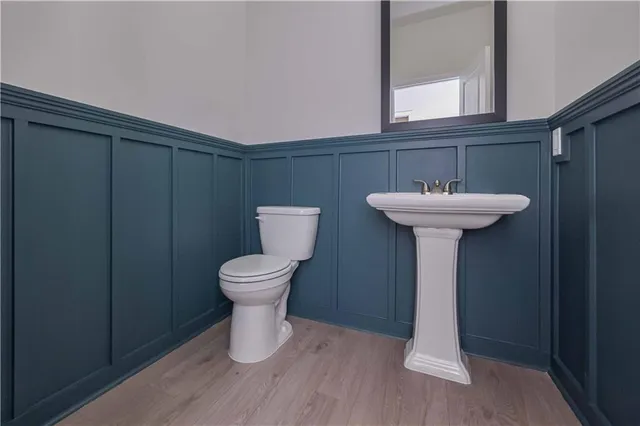 a bathroom with a sink and a toilet