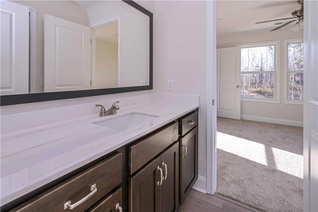 262 Corinth-Five Points Road Buchanan, GA 30113 - Photo 25 of 41 a bathroom with a sink a vanity and a mirror
